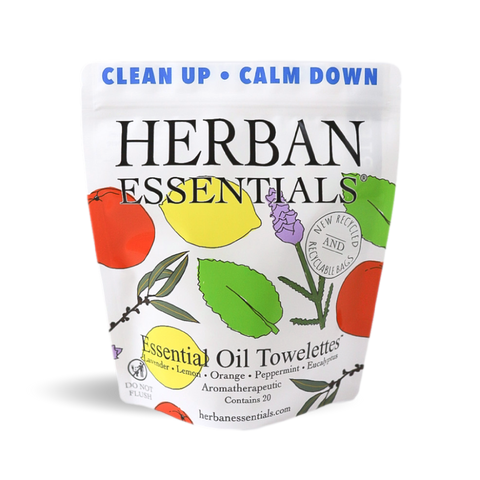 A package of Herban Essentials essential oil towelettes aromatherapeutic scents such as lemon, lavender, orange, peppermint, and eucalyptus.